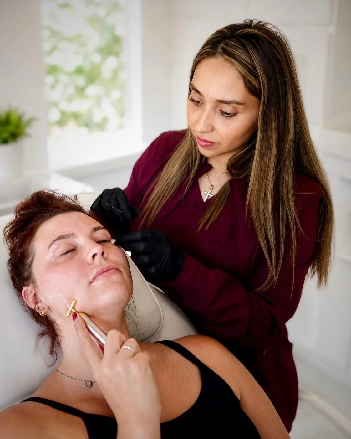 Desirée Antonelli giving a Botox treatment at Aesthetx Haus