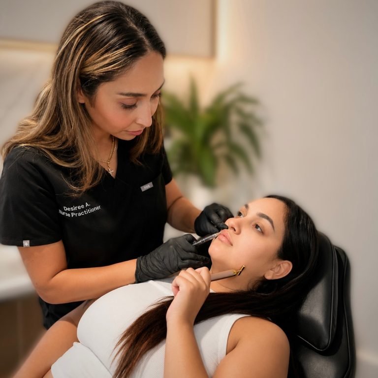Desiree treating a client (injectable)